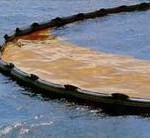 Oil spill containment boom. Via Wikipedia (commons)