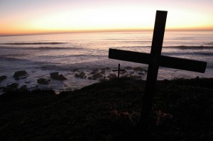 cross at beach by Wonderlane